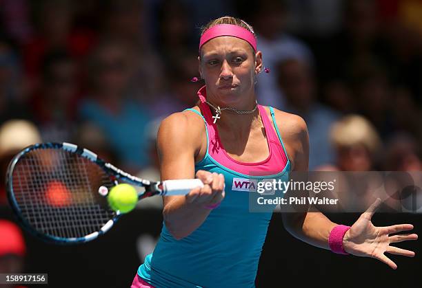 Yanina Wickmayer of Belguim plays a forehand in her semifinal match against Mona Barthel of Germany during day five of the 2013 ASB Classic at ASB...