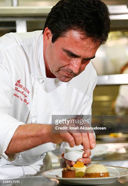 Executive pastry chef Thomas Henzi performs a cooking demonstration to showcase the menu for the 2013 Golden Globe Awards at The Beverly Hilton Hotel...