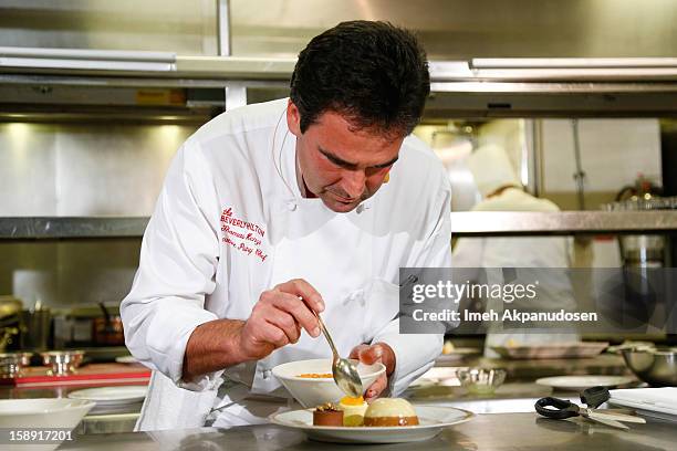 Executive pastry chef Thomas Henzi performs a cooking demonstration to showcase the menu for the 2013 Golden Globe Awards at The Beverly Hilton Hotel...