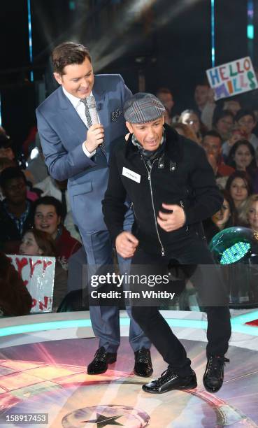 Presenter Brian Dowling with Frankie Dettori before he enters the Celebrity Big Brother House at Elstree Studios on January 3, 2013 in Borehamwood,...