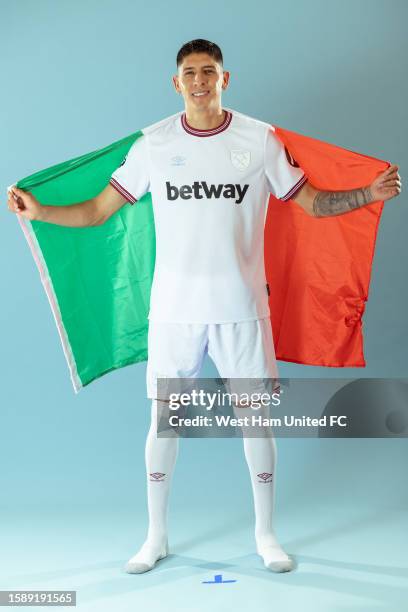 Edson Alvarez of West Ham poses after signing at London Stadium on August 09, 2023 in London, England.