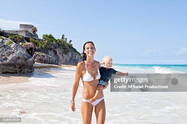 family beach - mexican and white baby stock pictures, royalty-free photos & images