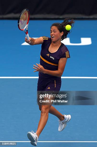 Jamie Hampton of the USA plays a forehand in her semifinal match against Agnieszka Radwanska of Poland during day five of the 2013 ASB Classic at the...
