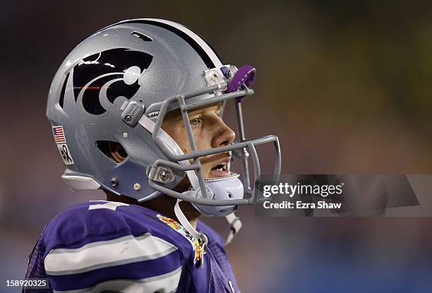 Collin Klein of the Kansas State Wildcats looks on from the bench in the third quarter against the Oregon Ducks during the Tostitos Fiesta Bowl at...