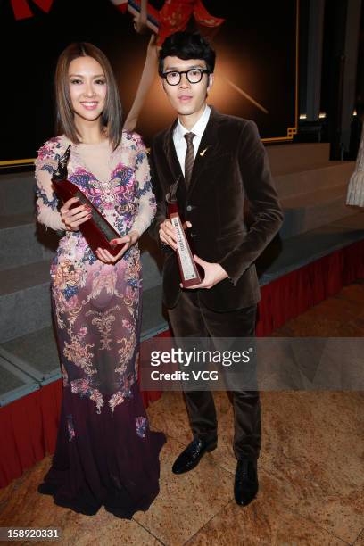 Singers Khalil Fong and Fiona Sit attend 2012 Chic Chak Music Awards at Hong Kong Convention and Exhibition Center on January 2, 2013 in Hong Kong,...