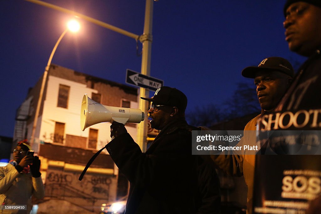 Anti Violence Activist Group Hosts Community Vigil For Victims On New Year's Day Shooting