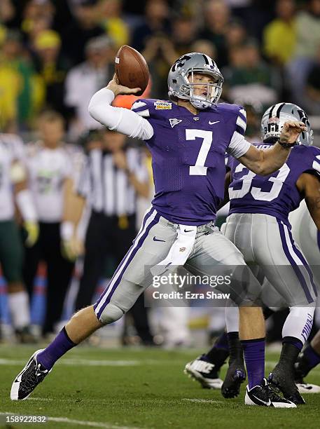 Collin Klein of the Kansas State Wildcats drops back to pass against the Oregon Ducks during the Tostitos Fiesta Bowl at University of Phoenix...