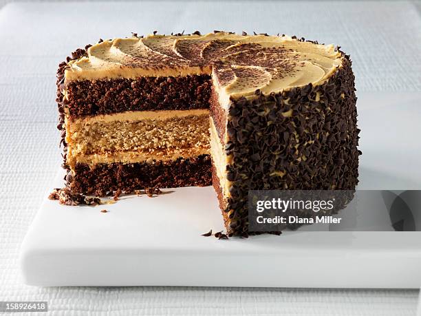 plate of cappuccino layer cake - slice cake stock pictures, royalty-free photos & images