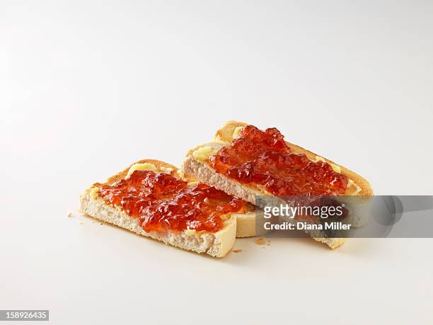 toast with butter and jam - strawberry jam stock pictures, royalty-free photos & images