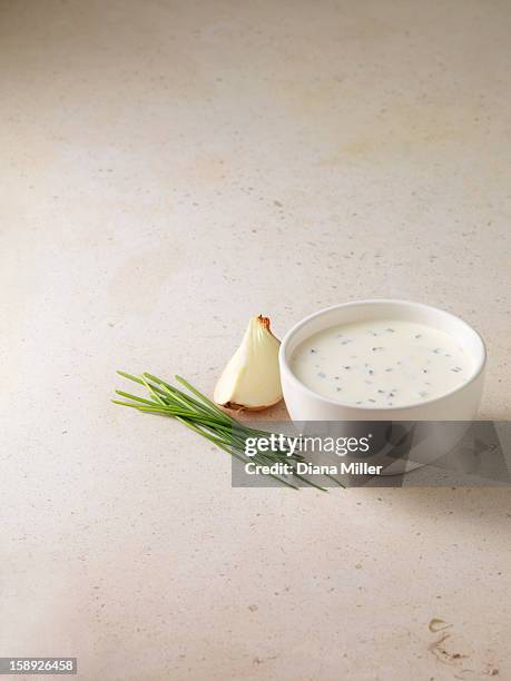 bowl of sour cream and chive dip - sour cream stock pictures, royalty-free photos & images