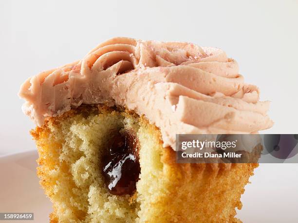 close up of filled cupcake - diana center stock pictures, royalty-free photos & images