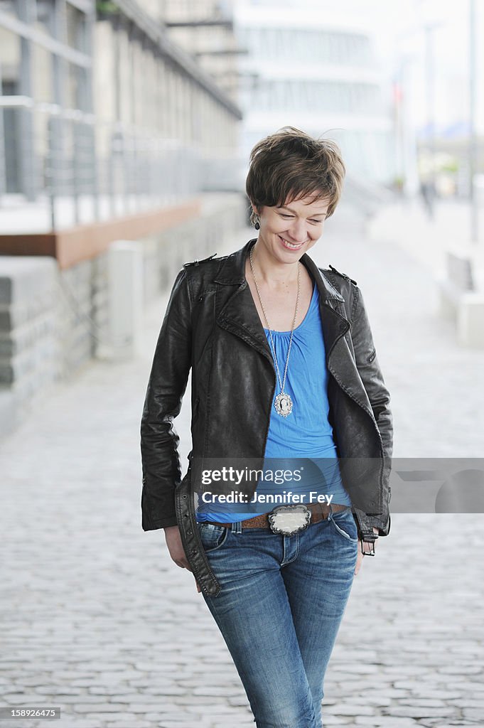 Woman walking on city street