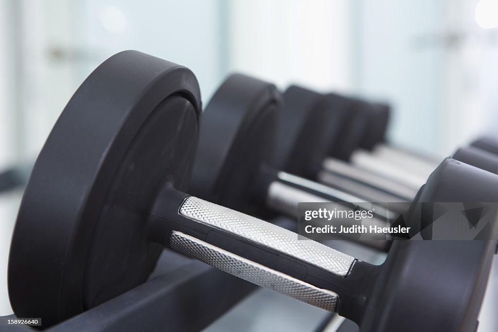 Close up of free weights in gym