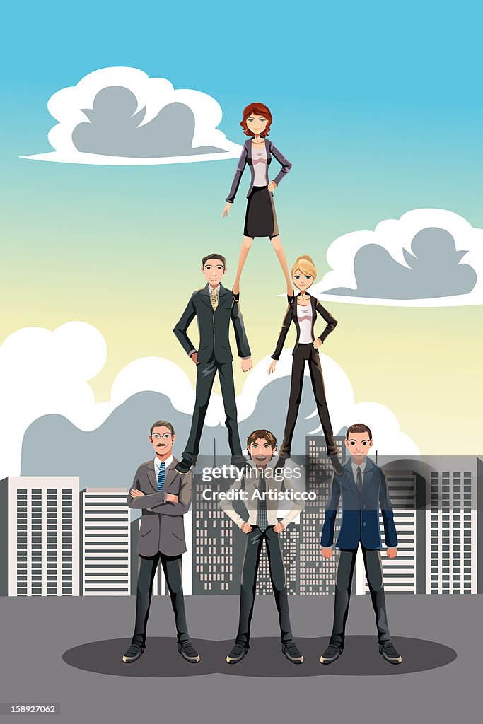 A woman standing on the shoulders of two business associates