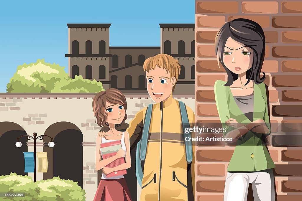 A girl standing with her arms crossed as a couple are walking by