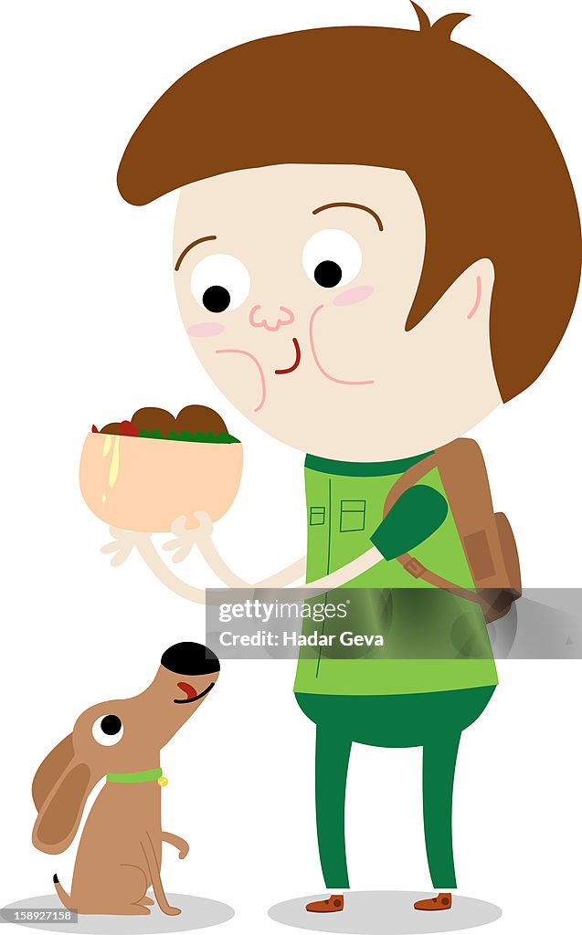 A man holding a bowl of food over a dog