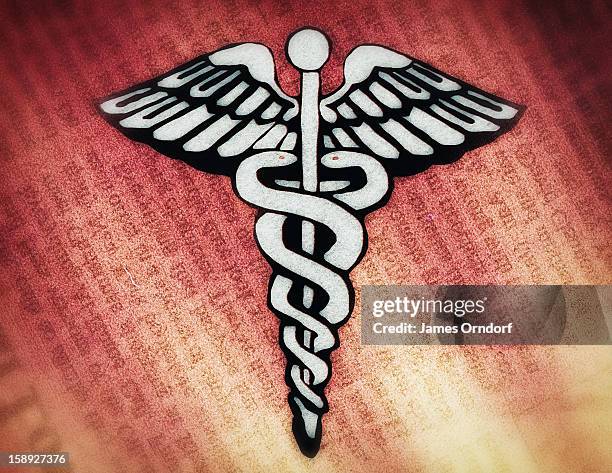 caduceus symbol - james orndorf stock illustrations