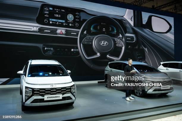South Korean automobile manufacturer Hyundai introduces the new multi purpose vehicle "Stargazer X" during the 30th Gaikindo Indonesia International...