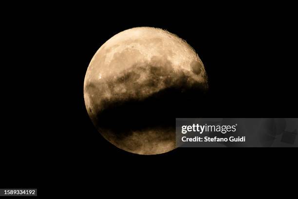 Clouds pass by Sturgeon Super Moon as seen on August 2, 2023 in Turin, Italy. This is the first of two super moons in the month of August, with the...