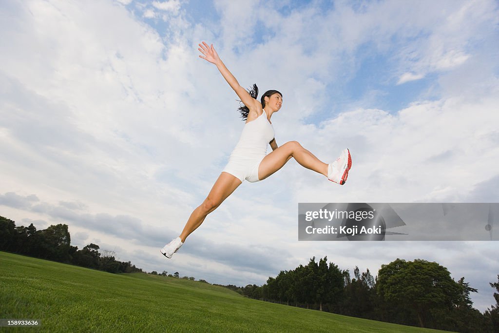 Young Woman jumping in the air