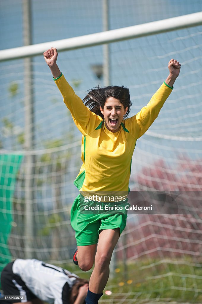 Soccer player celebrating victory