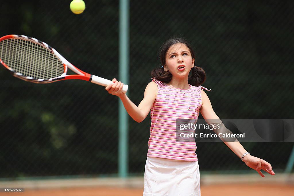 Girl Hitting Forehand Shot