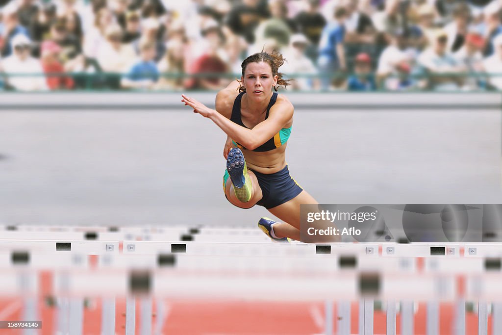 Female Runner Hurdling