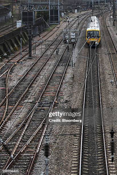 FirstGroup Plc train is seen arriving at Paddington railway station in London, U.K., on Thursday, Jan. 3 2013. Rail commuters have been hit by...