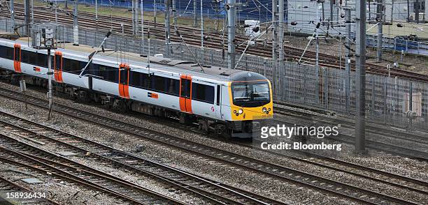 London Overground Operations Ltd. Train arrives at Paddington railway station in London, U.K., on Thursday, Jan. 3 2013. Rail commuters have been hit...