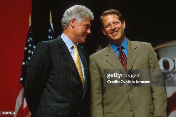 Democratic presidential candidate Vice President Al Gore has President Bill Clinton's ear during a meeting with his supporters in Little Rock,...