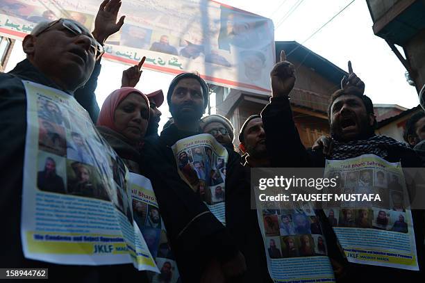 Jammu Kashmir Liberation Front chairman Yasin Malik with supporters marches during a protest against a court verdict sentencing two Kashmiris to life...