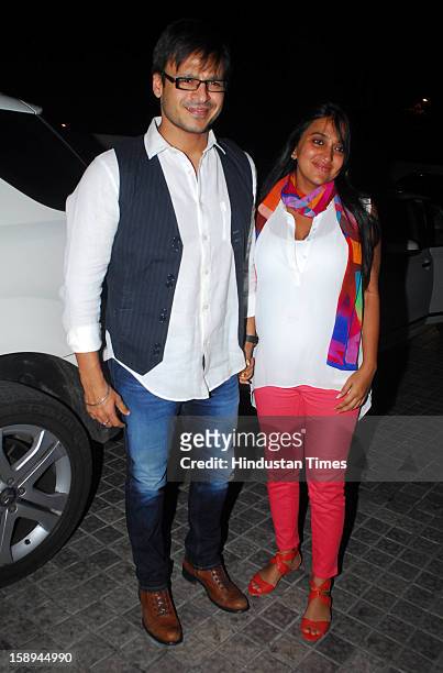 Bollywood actor Vivek Oberoi with his wife Priyanka attending special screening hosted by Ritesh Deshmukh for his first home production Marathi film...