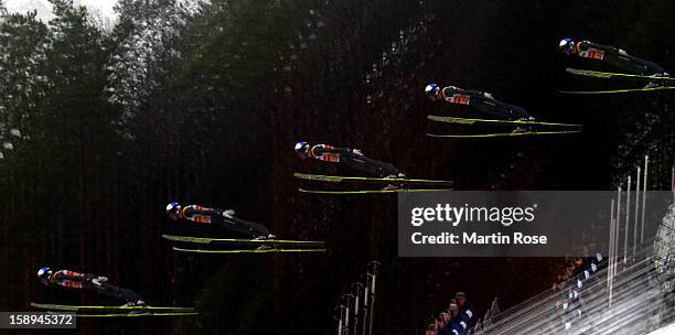 Multiple-exposure sequence of Greogor Schlierenzauer of Ausria during the trial round for the FIS Ski Jumping World Cup event of the 61st Four Hills...