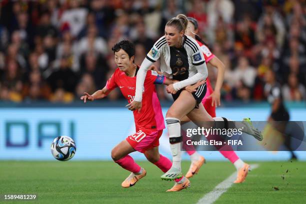Kim Hyeri of Korea Republic battles for possession with Jule Brand of Germany during the FIFA Women's World Cup Australia & New Zealand 2023 Group H...