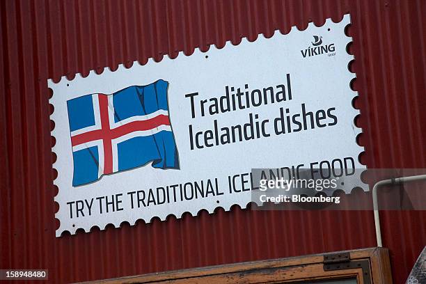 National flag is seen on an advertisement for traditional Icelandic food in Reykjavik, Iceland, on Wednesday, Jan. 2, 2013. Creditors of Iceland's...