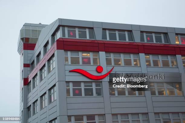 Logo sits on the exterior of the Islandsbanki hf offices in Reykjavik, Iceland, on Thursday, Jan. 3, 2013. Creditors of Iceland's three biggest...