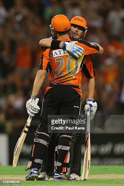 Shaun Marsh and Marcus North of the Scorchers celebrate winning the Big Bash League match between the Perth Scorchers and the Sydney Thunder at WACA...