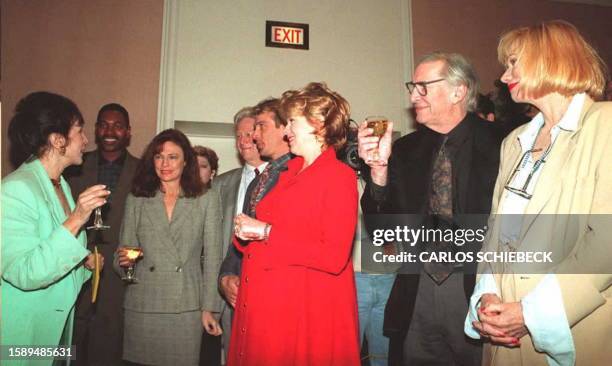 Aida Takla O'Reilly , President of the Hollywood Foreign Press Association, toasts the celebrities who helped announce the nominations for the 1995...