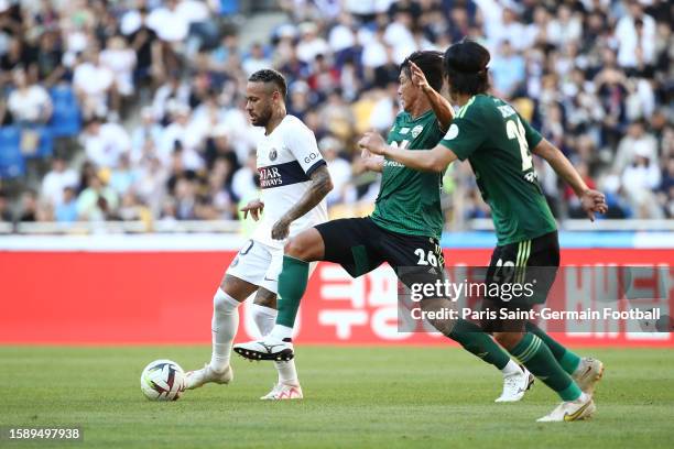 Neymar Jr of Paris Saint-Germain battles for possession with Hong Jeong-ho of Jeonbuk Hyundai Motors during the preseason friendly between Jeonbuk...