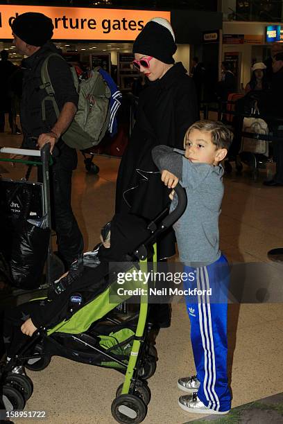 Gwen Stefani and Kingston Rossdale seen at Heathrow Airport on January 4, 2013 in London, England.