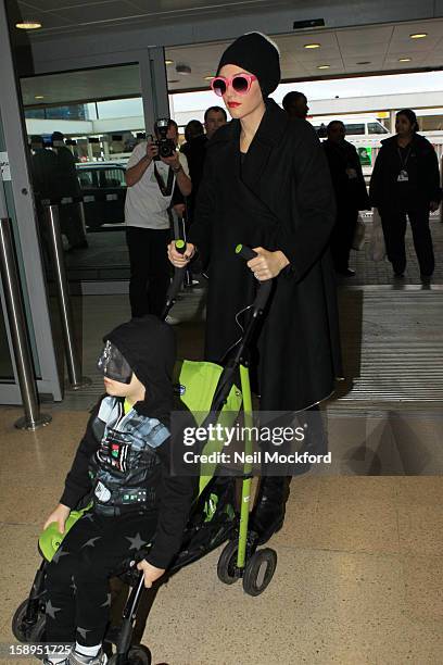 Gwen Stefani and Zuma Rossdale seen at Heathrow Airport on January 4, 2013 in London, England.