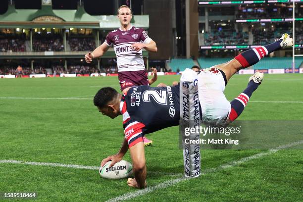 Daniel Tupou of the Roosters scores a try in the corner during the round 23 NRL match between the Sydney Roosters and Manly Sea Eagles at Sydney...