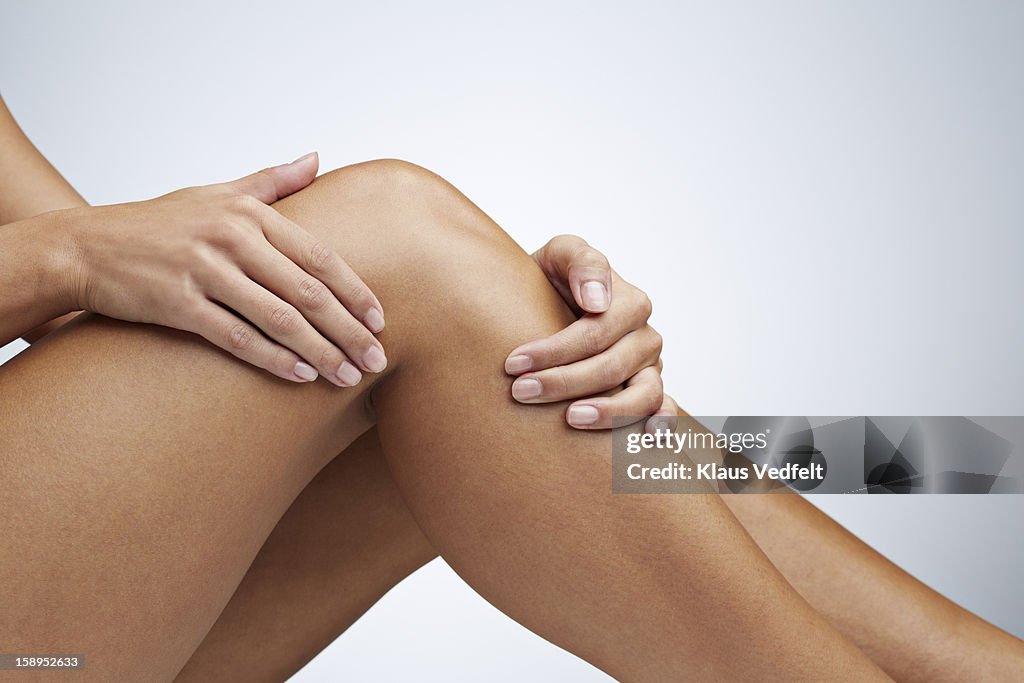 Close up of woman having knee pain