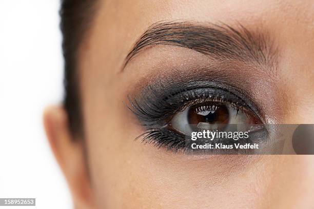 close-up of female eye with make-up - smokey eyeshadow foto e immagini stock