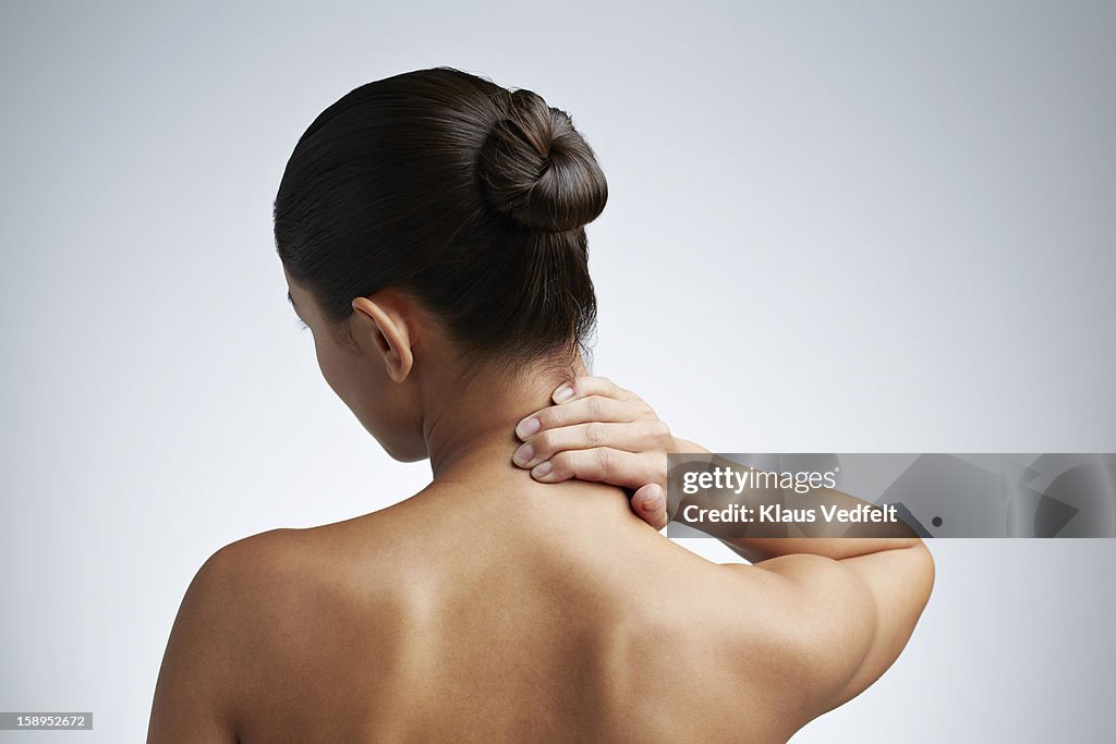 Close up of woman having neck pain