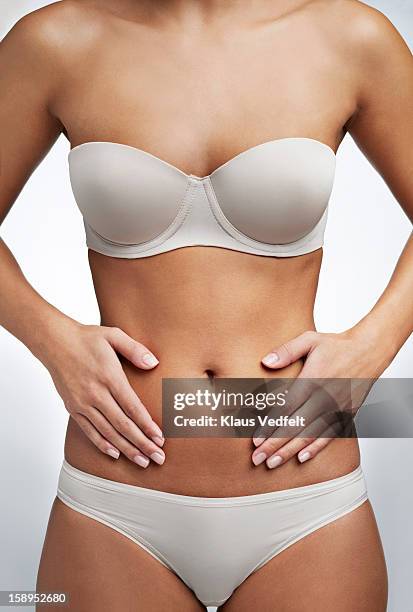 close up of woman having stomach pain - strapless stock pictures, royalty-free photos & images