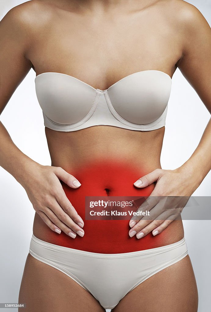 Close up of woman having stomach pain