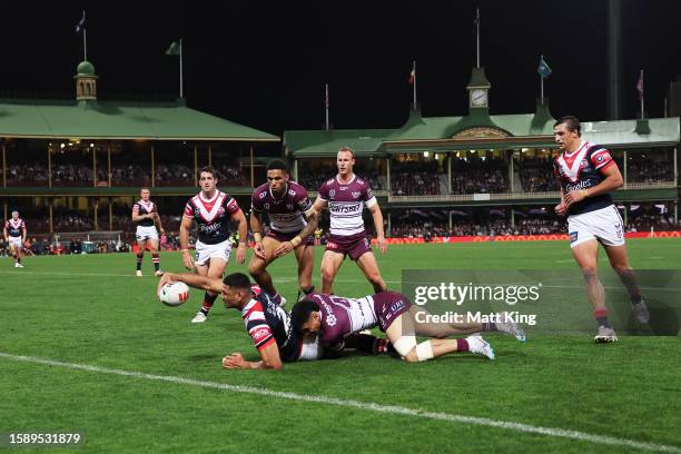 Daniel Tupou of the Roosters scores a try during the round 23 NRL match between the Sydney Roosters and Manly Sea Eagles at Sydney Cricket Ground on...
