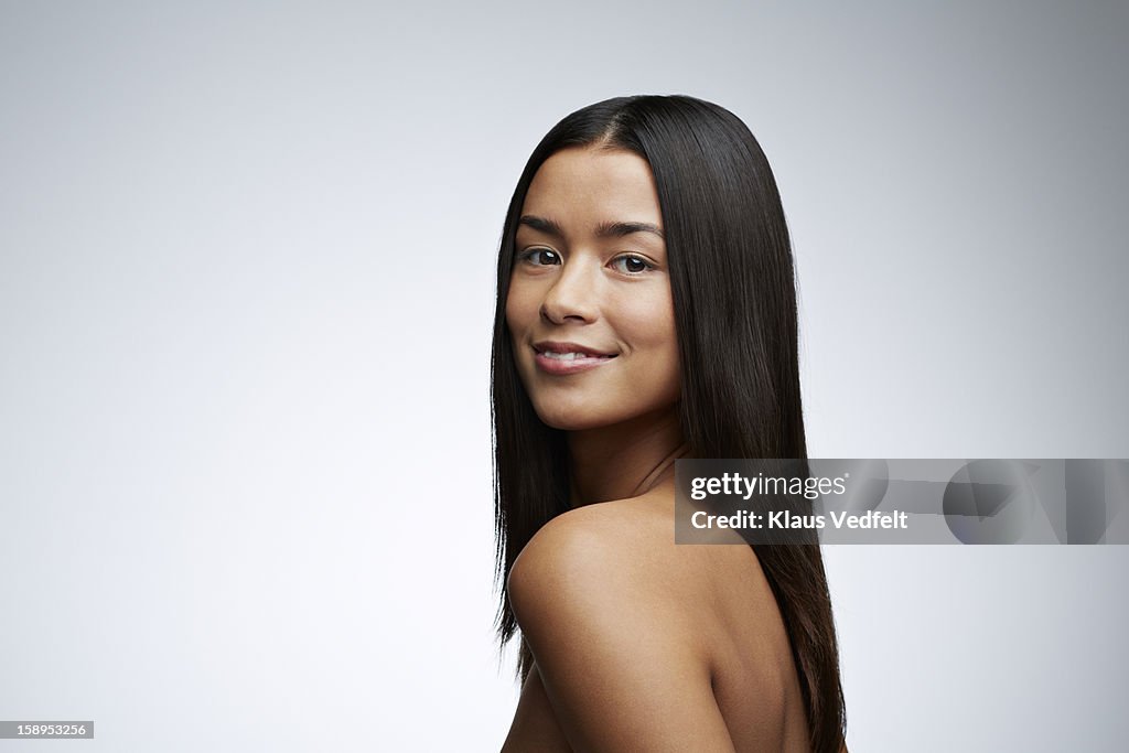 Beauty portrait of woman smiling to camera