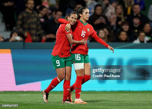 Anissa Lahmari of Morocco celebrates with teammate Ibtissam Jraidi after scoring her team's first goal during the FIFA Women's World Cup Australia &...